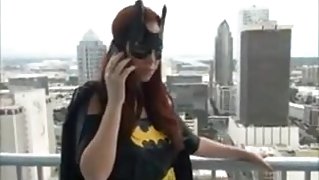 Batgirl gives a pantyhose footjob 1